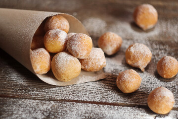 Fritule - Croatian mini doughnuts. Selective focus
