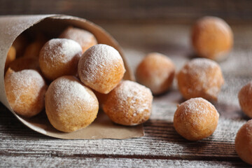 Fritule - Croatian mini doughnuts. Selective focus
