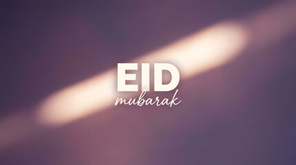 Eid Mubarak greeting card with blurred background and light effect.