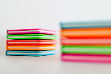 colourful children books on minimalist setup, concept of learning to read and early education