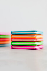 colourful children books on minimalist setup, concept of learning to read and early education