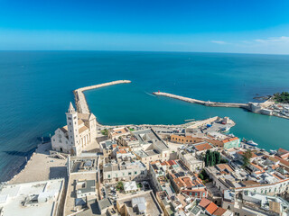 Aerial View of Trani: The Medieval Swabian Castle, Historic Old Town, and Vibrant Fishing Port along the Adriatic Coastline