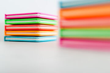 colourful children books on minimalist setup, concept of learning to read and early education