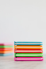 colourful children books on minimalist setup, concept of learning to read and early education