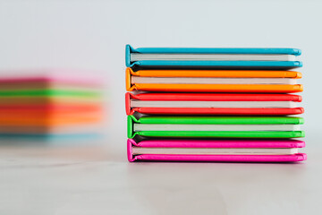 colourful children books on minimalist setup, concept of learning to read and early education