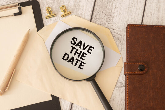 Notebook with inscription "Save the Date", calendar