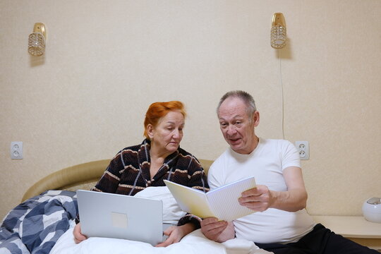 Senior couple, tablet and clipboard at house for finance planning, review bills and payment checklist. Elderly people, digital and document for investment, insurance application and asset .