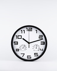 Modern Wall Clock with Thermometer and Hygrometer on White Background