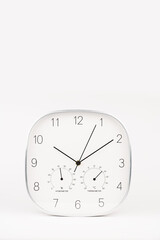 Modern Wall Clock with Thermometer and Hygrometer on White Background