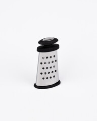 Steel grater for food. Grate the product. Vegetable grater.