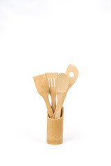 Wooden kitchen utensil set. Wooden cutlery for cooking.