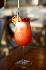 Bright and refreshing summer red cocktail.