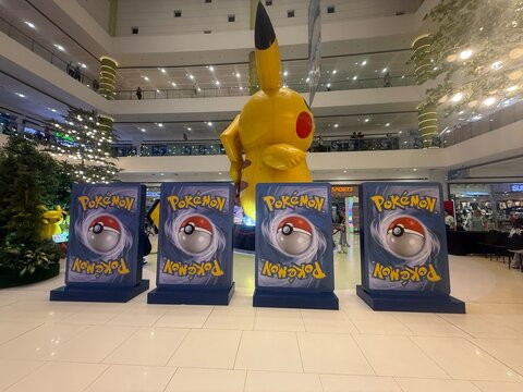 October 2025, SM San Jose del Monte, Philippines: Pikachu statue and displays of jumbo-sized Pok&eacute;mon Trading Card Game (TCG) cards. 