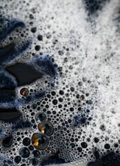 Cashmere Wool Sweater Being Hand Washed with Delicate Detergent