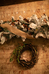 Decorative wreath and garland with rustic charm in a cozy indoor setting during the winter season