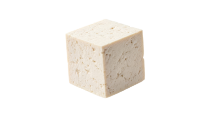 Isolated block of firm tofu, soybean curd against bright background, healthy eating concept of delicious meatless plant based protein for balanced