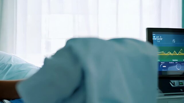 Recovery monitor beside resting patient in post op room, technician watches live vitals on colorful display, calm daylight, infusion pole and soft curtain in background suggesting stable