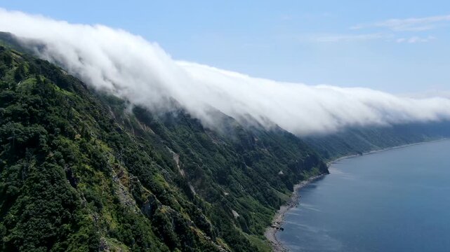 Flight over the caldera of the extinct volcano Lion's Mouth, Iturup Island, Kuril Islands