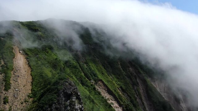 Flight over the caldera of the extinct volcano Lion's Mouth, Iturup Island, Kuril Islands