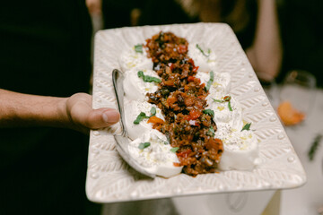 Mouthwatering appetizer with fresh ingredients served at a stylish dining setting