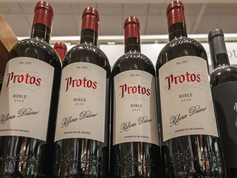 Bottles of Protos Roble Red Wine Displayed on Shelf