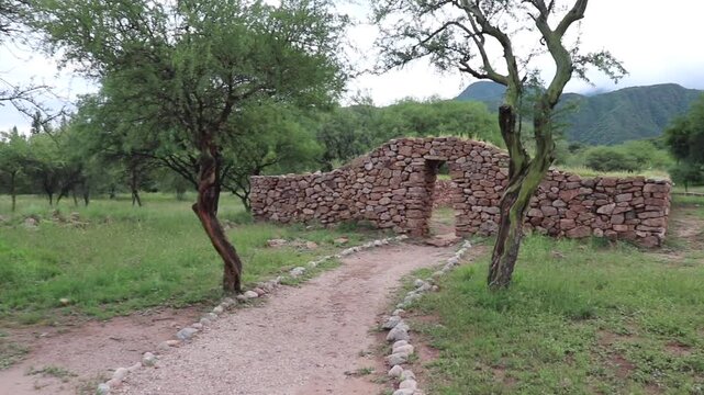Zoom in shot on the detail of an ancient Inca stone gateway or door opening in a pirca wall at El Shincal de Quimivil Londres Catamarca Argentina archeological site