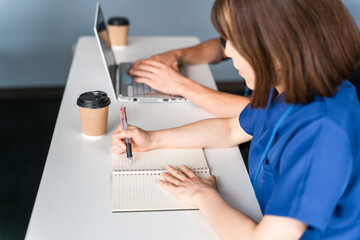 Medical conference, study group, seminar, training male and female medical staff in scrubs, medical...