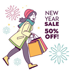 Smiling woman with shopping bags and fireworks celebration