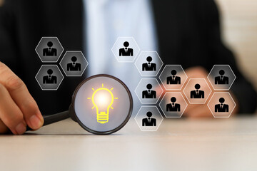 Businessman's hand chooses person HR human resources icons for leader or group teamwork people officer or business planning relationship or team player and personnel management job performance.