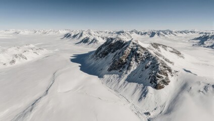 Vast Snowy Mountain Range Under a Clear Sky.