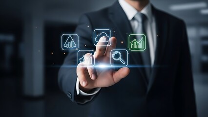 Businessman interacting with futuristic digital interface for data analytics and cloud.