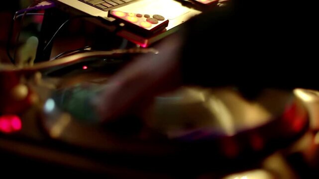 Close up of dj playing party music modern cd player in disco club Nightlife entertainment concept.