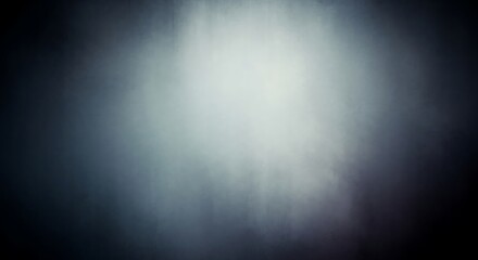 Abstract light streaks and blurred textures create a moody and atmospheric background