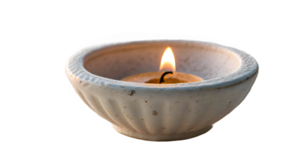 a matte ceramic oil lamp with subtle visible flame and soft glow
