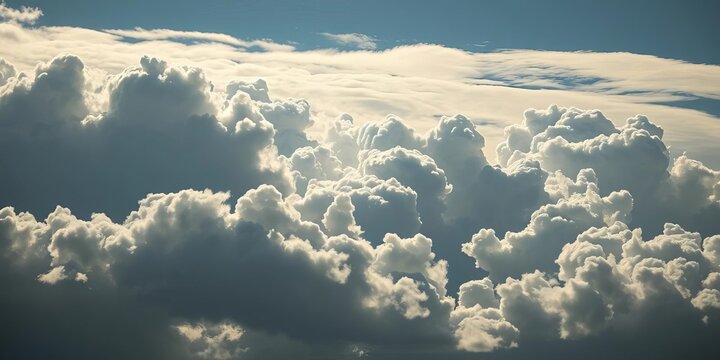 Dense cumulus cloudscape, dramatic light and shadow,  dramatic,   vista