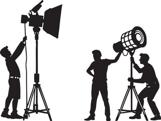 Silhouettes of photographers setting up studio equipment, isolated on