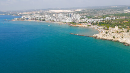 Kizkalesi, Mersin, Turkey. Aerial coastline view with sandy beaches, Maiden Castle on island and historic Korykos Castle on shore, summer.. Aerial View