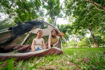 Technician installs solar panels on a rooftop in a city setting during daytime