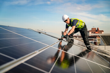 Professional who installs solar energy systems,  procuring equipment, and performing the physical...