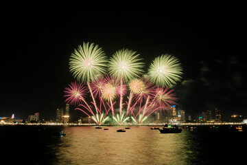 Spectacular colorful fireworks at Pattaya International Fireworks Festival 2025 viewed from a raft...