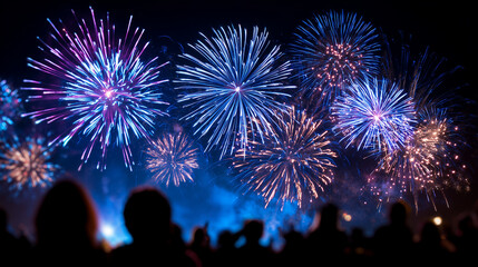 Spectacular fireworks illuminating the night sky during Chinese New Year celebration with crowd watching below