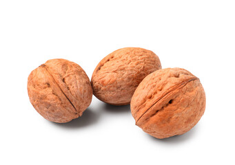 Whole walnuts on white background