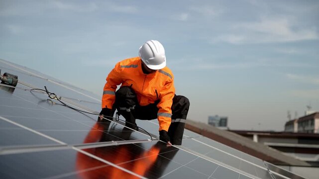 Professional who installs solar energy systems,  procuring equipment, and performing the physical installation of solar panels on roofs. 