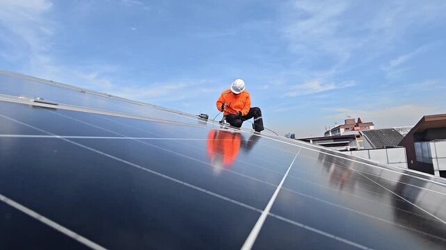 Professional who installs solar energy systems,  procuring equipment, and performing the physical installation of solar panels on roofs. 