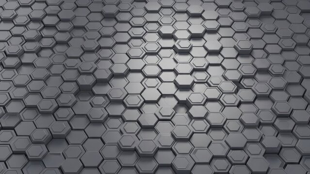 Dynamic dark grey metallic hexagonal pattern background creating an abstract geometric texture, perfect for modern digital design, high-tech concepts, and futuristic visuals