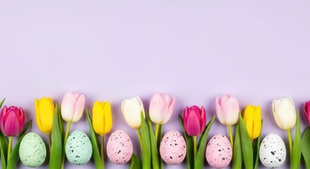 Colorful tulips and Easter eggs arranged on a soft purple background