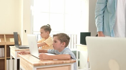 Caucasian teacher helping american student coding engineering prompt while diverse student using software generated AI. Smart attractive children sitting and programing system. Education. Pedagogy. - Powered by Adobe