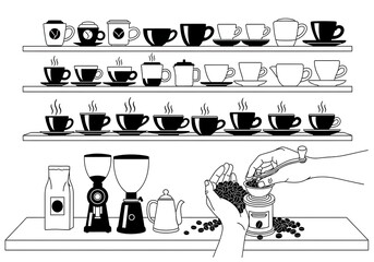 Coffee cups on shelves with grinder and coffee beans