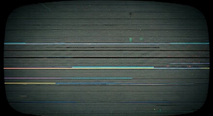 Aged, rectangular frame displaying horizontal, static digital distortion over a textured surface