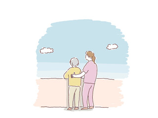 高齢女性と空を見上げる女性（看護師、ヘルパー、介護士）